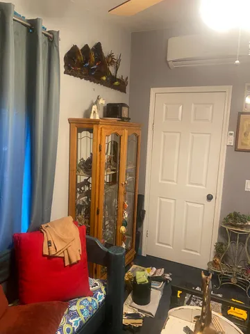 a view of a chairs and table in a backyard