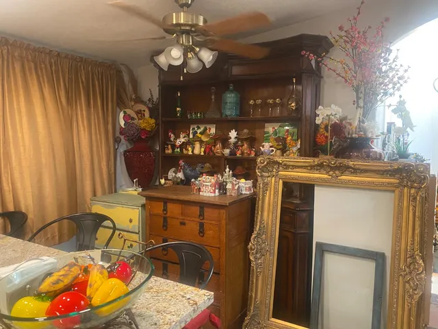 a room with table and chairs