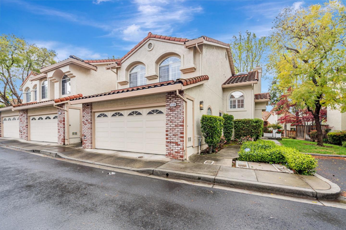 front view of a house with a street