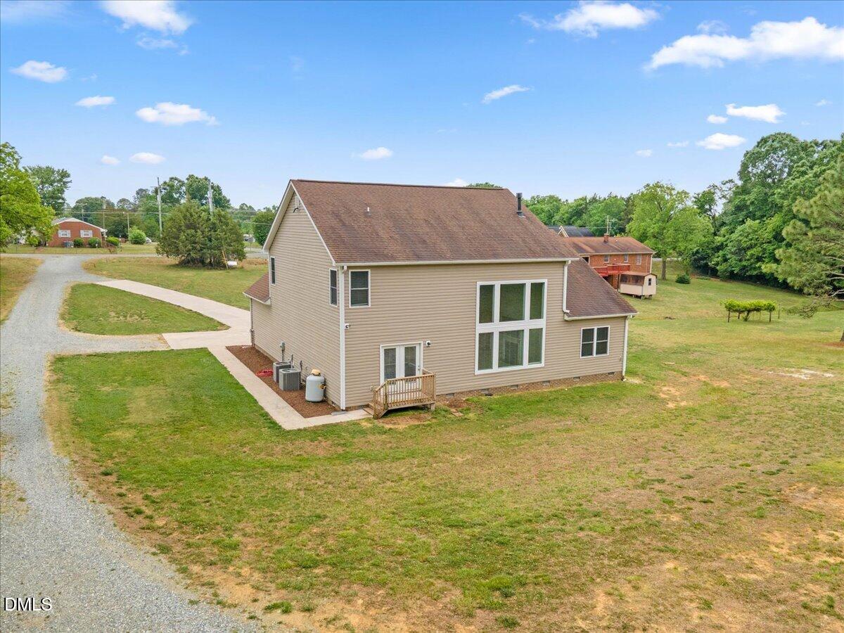 704 Haw River Hopedale Road Burlington, NC 27217 - Photo 36 of 49 a view of a house with a swimming pool