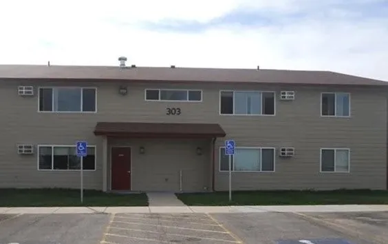 a view of a house with a garden