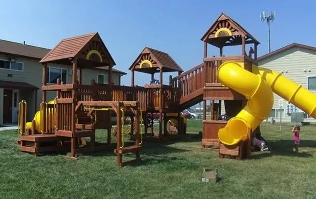 a white refrigerator freezer sitting inside of a kitchen