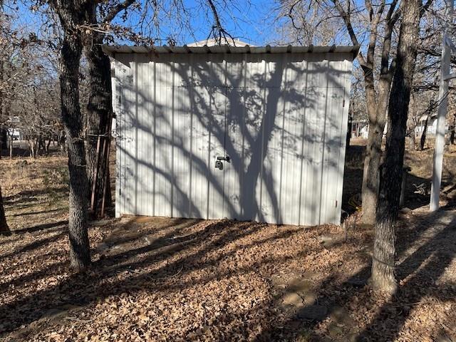 2000 Willow Drive May, TX 76857 - Photo 7 of 10 a view of a yard with wooden fence