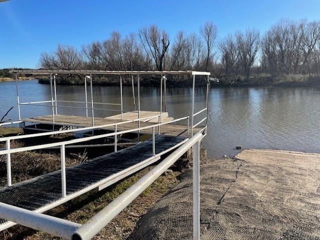 2000 Willow Drive May, TX 76857 - Photo 8 of 10 a view of a lake with a mountain view