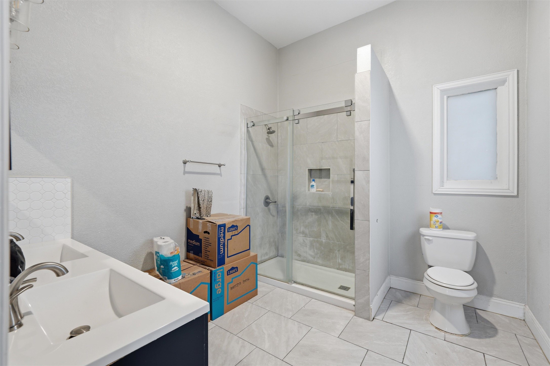 803 North 3rd Street Temple, TX 76501 - Photo 12 of 22 a bathroom with a sink mirror vanity and toilet