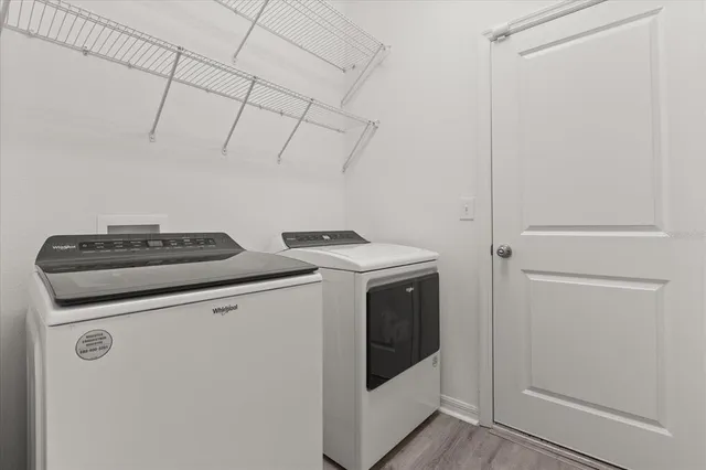 a utility room with dryer and washer