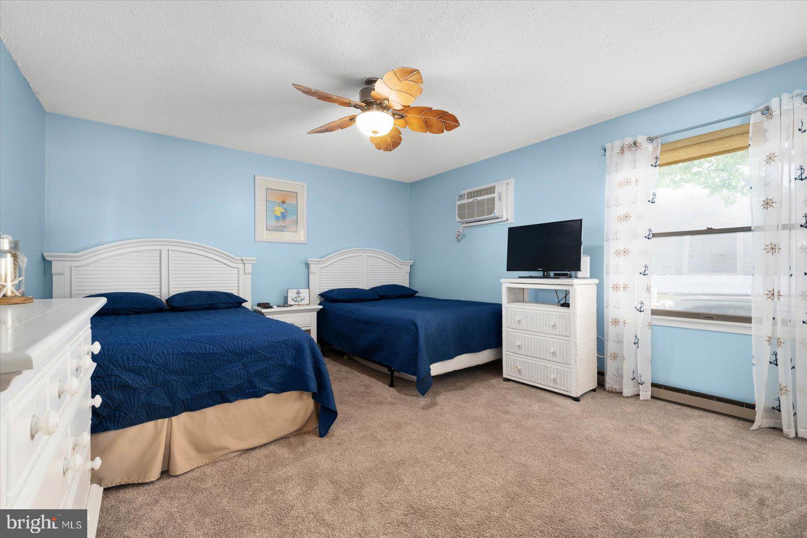 620 Salt Spray Road, Unit 1W Ocean City, MD 21842 - Photo 14 of 27 Primary bedroom with ceiling fan