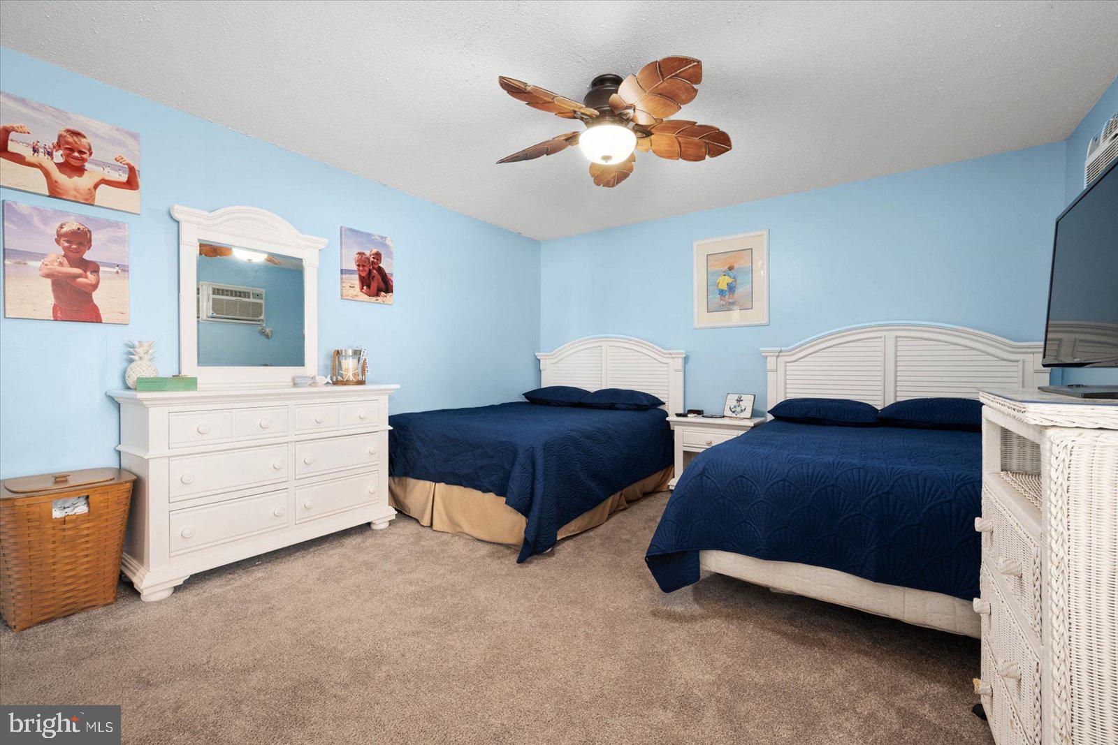 620 Salt Spray Road, Unit 1W Ocean City, MD 21842 - Photo 15 of 27 Spacious bedroom with ceiling fan