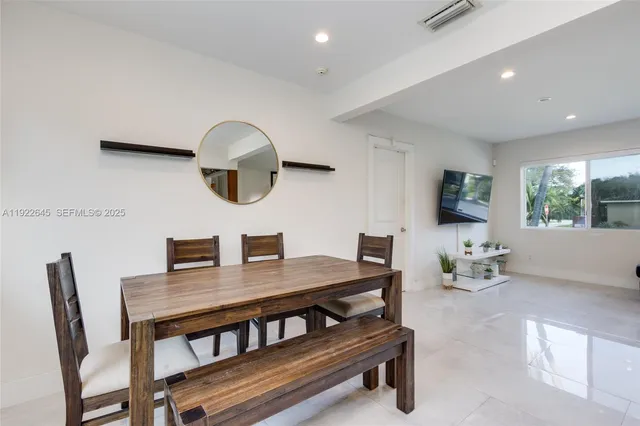 a workspace with furniture and window