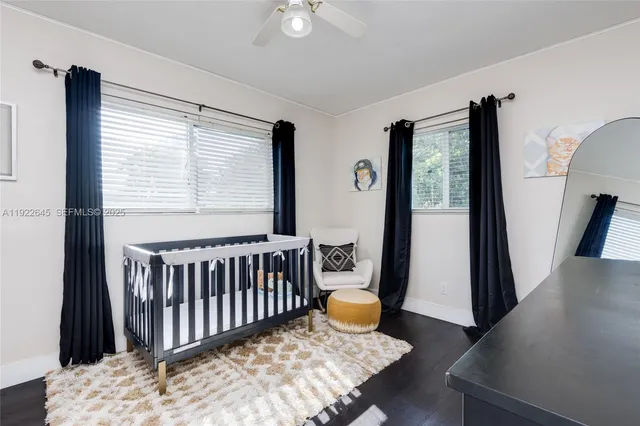 a view of an empty room with glass door