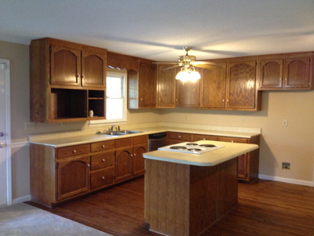 6310 Stapleton Road Macon, GA 31206 - Photo 4 of 15 a kitchen with a stove and a sink