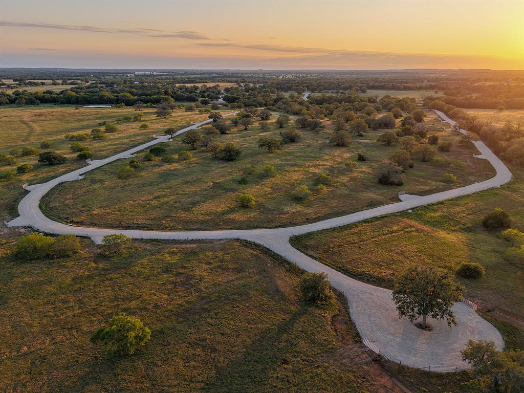 716 Main Loop Waelder, TX 78959 - Photo 6 of 9 an aerial view of a house with a yard