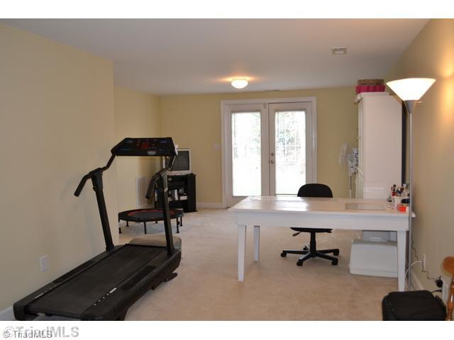 3100 Timberwolf Avenue High Point, NC 27265 - Photo 14 of 16 Den/Family/Great Room. What great space in the walk-out basement! So many potential uses... game room, media room, play room, exercise room, office... what will you use it for?