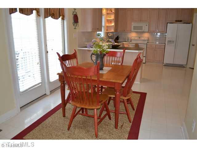 3100 Timberwolf Avenue High Point, NC 27265 - Photo 5 of 16 Breakfast. The sunny breakfast room flows into the kitchen, and leads to the beautiful deck!