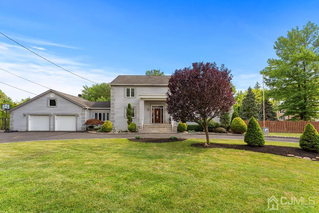 713 New Dover Road Edison, NJ 08820 - Photo 2 of 46 a view of a house with a yard and sitting area
