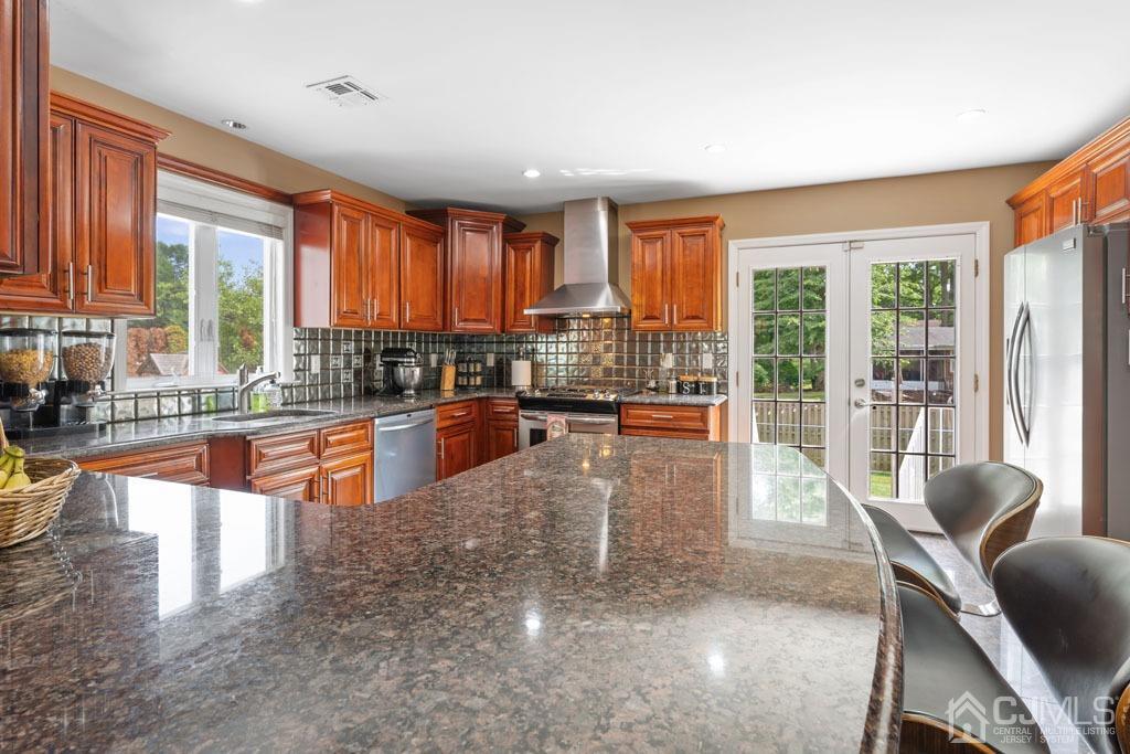 713 New Dover Road Edison, NJ 08820 - Photo 14 of 46 a large kitchen with granite countertop a large window and a counter space