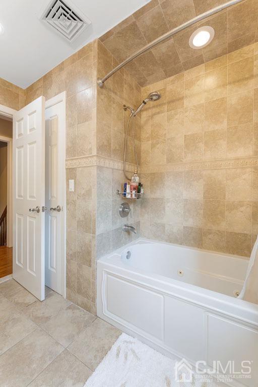 713 New Dover Road Edison, NJ 08820 - Photo 25 of 46 a bathroom with a bathtub and a shower