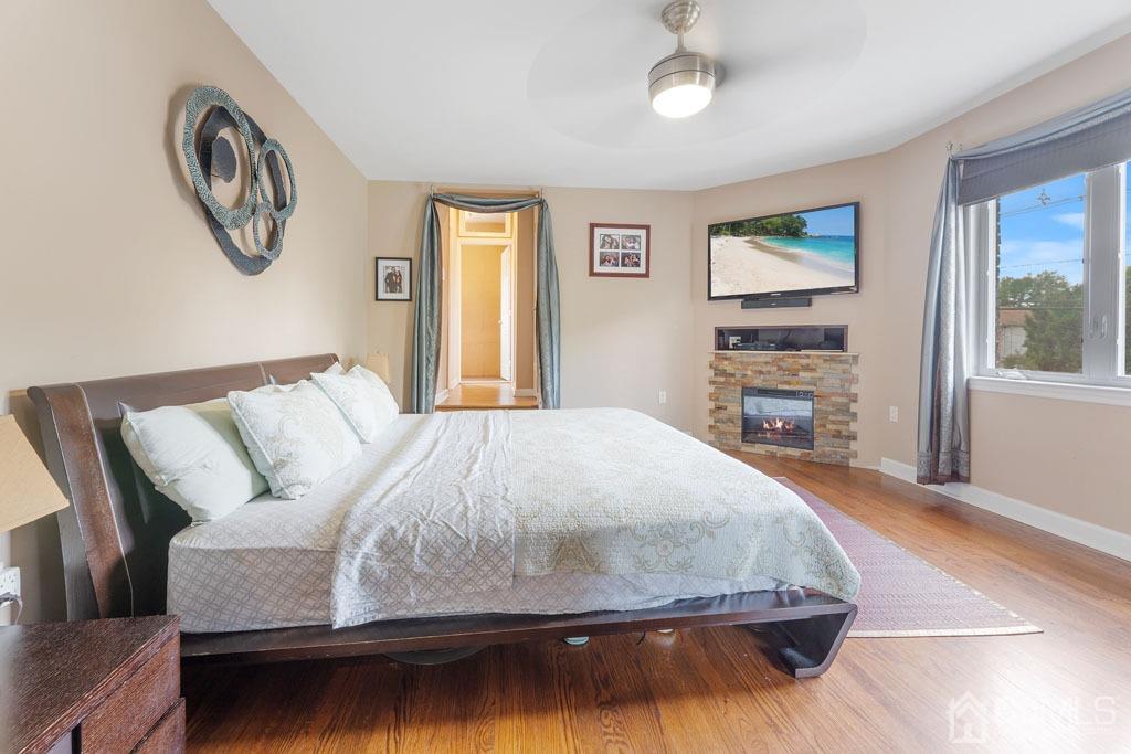 713 New Dover Road Edison, NJ 08820 - Photo 28 of 46 a bedroom with a large bed and a window