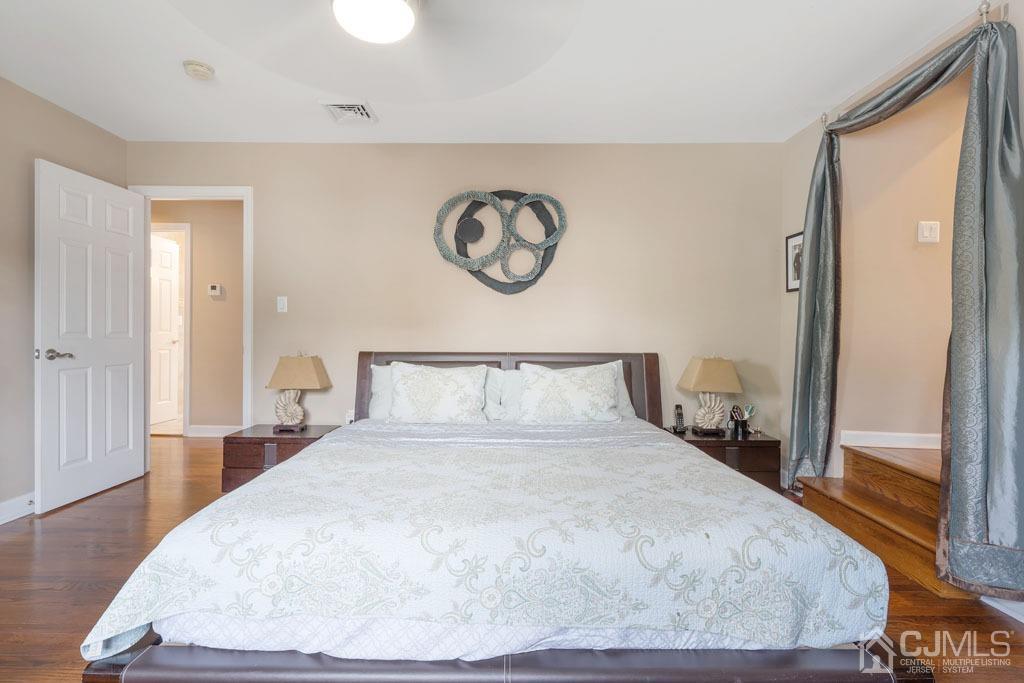713 New Dover Road Edison, NJ 08820 - Photo 29 of 46 a large white bed in a white room