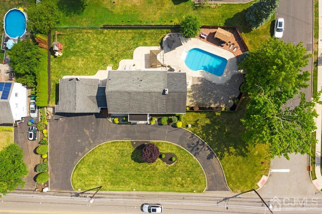 713 New Dover Road Edison, NJ 08820 - Photo 38 of 46 an aerial view of a house with swimming pool and outdoor seating