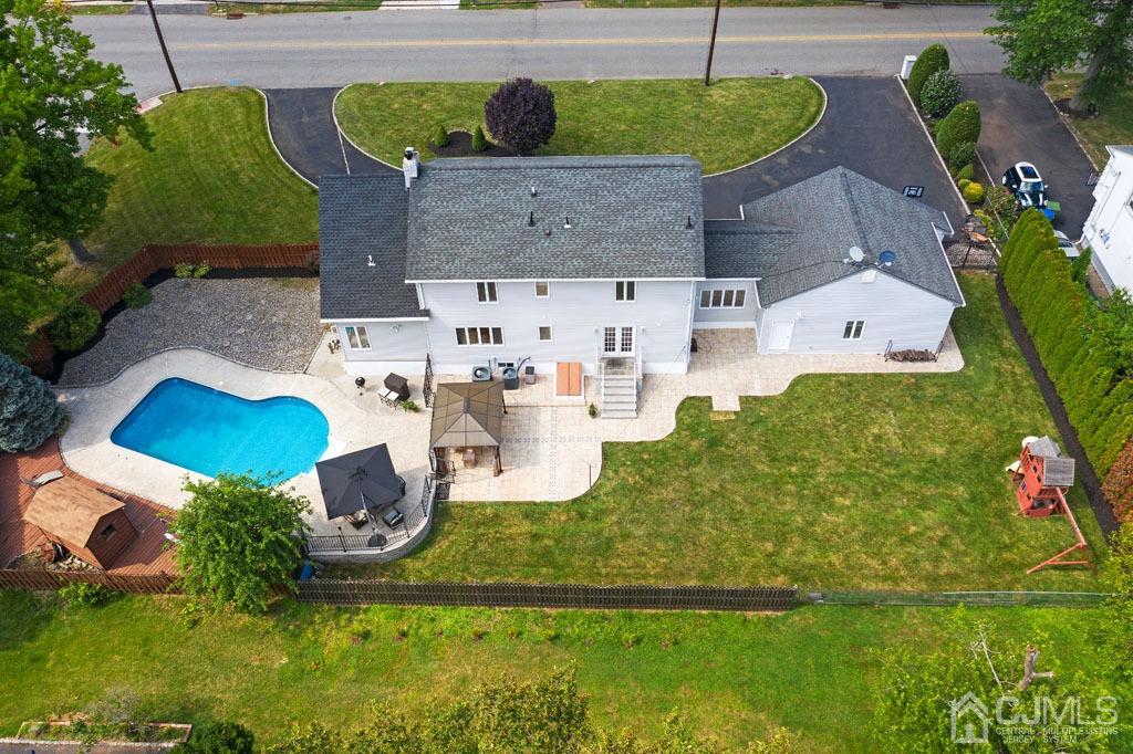 713 New Dover Road Edison, NJ 08820 - Photo 39 of 46 an aerial view of a house with yard swimming pool and outdoor seating
