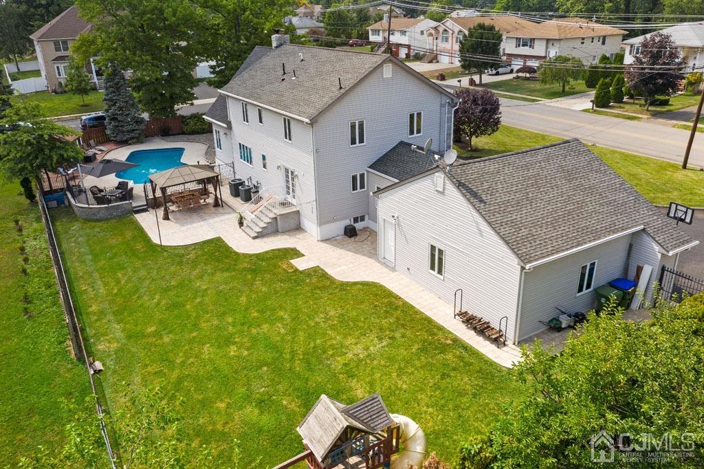 713 New Dover Road Edison, NJ 08820 - Photo 43 of 46 an aerial view of a house with swimming pool garden and patio