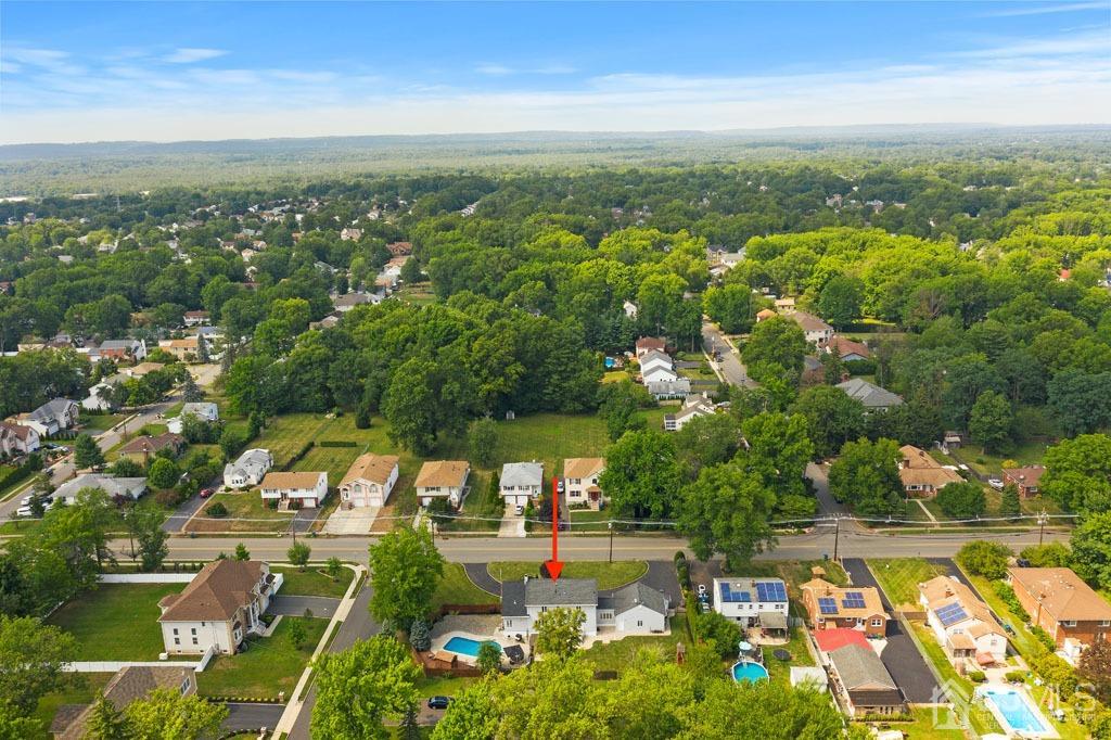 713 New Dover Road Edison, NJ 08820 - Photo 46 of 46 an aerial view of residential houses with outdoor space and trees