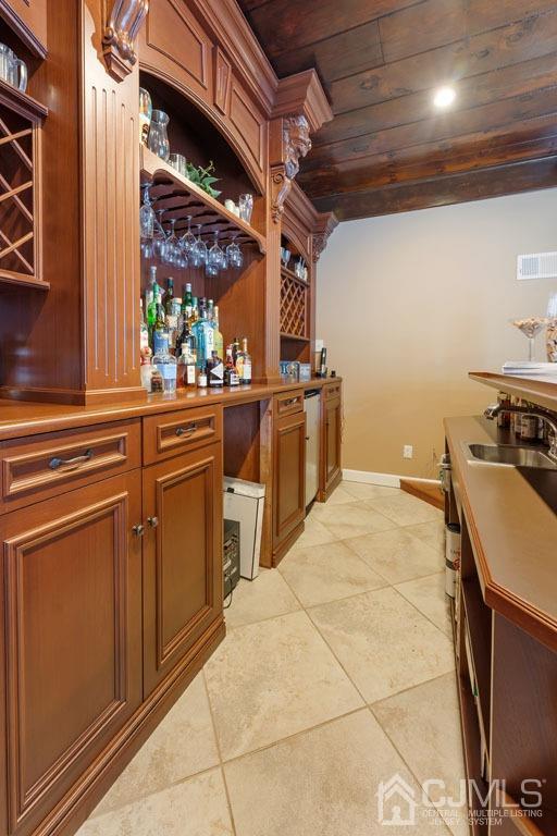 713 New Dover Road Edison, NJ 08820 - Photo 9 of 46 a kitchen with a sink and cabinets