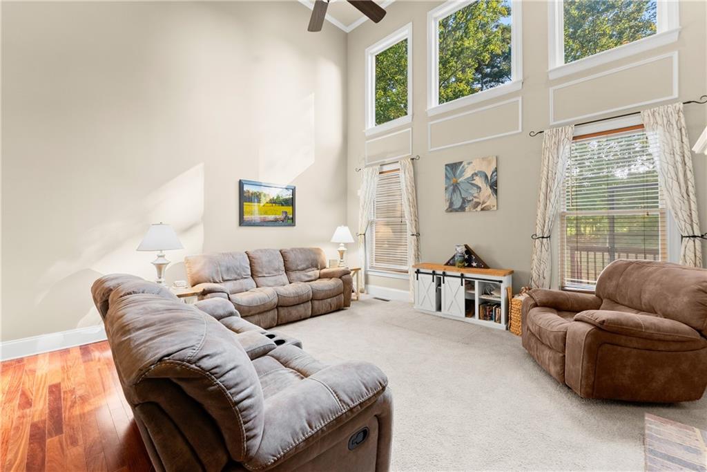 799 Traditions Way Jefferson, GA 30549 - Photo 20 of 53 a living room with furniture and a window