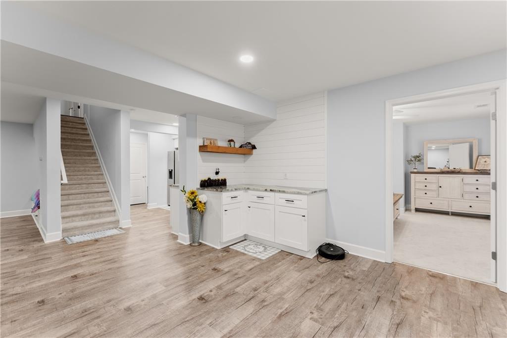 799 Traditions Way Jefferson, GA 30549 - Photo 35 of 53 a view of a room with wooden floor and electronic appliances