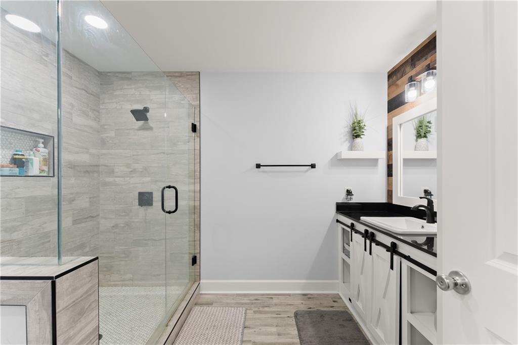 799 Traditions Way Jefferson, GA 30549 - Photo 42 of 53 a kitchen that has a sink a stove and a refrigerator