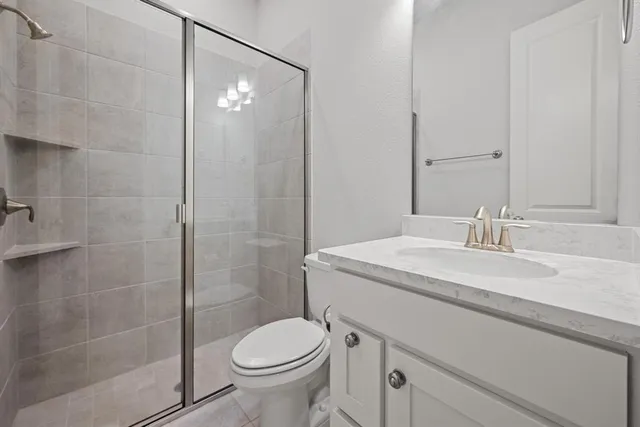 a view of kitchen with furniture and cabinets