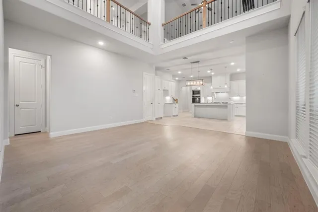 a view of a living room and kitchen with furniture