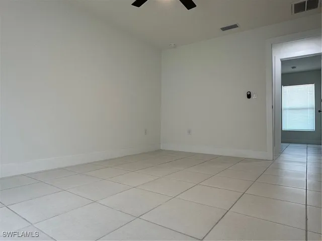 a bathroom with a shower and a toilet