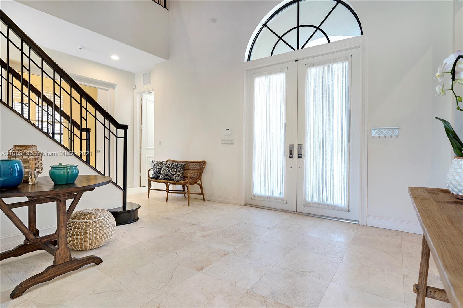 17752 Vecino Way Boca Raton, FL 33496 - Photo 2 of 30 a view of a livingroom with furniture and stairs