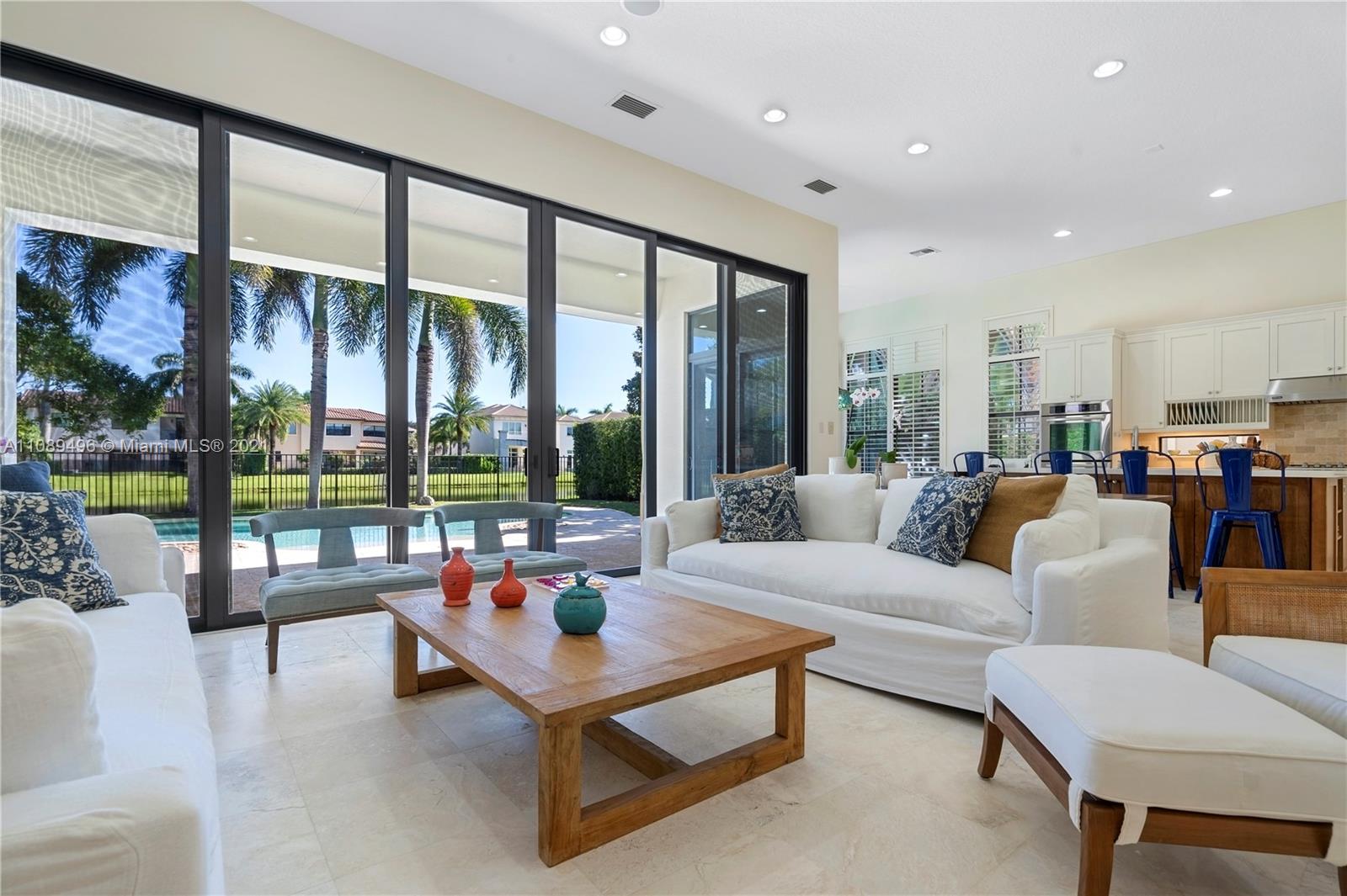 17752 Vecino Way Boca Raton, FL 33496 - Photo 8 of 30 a living room with furniture and a large window