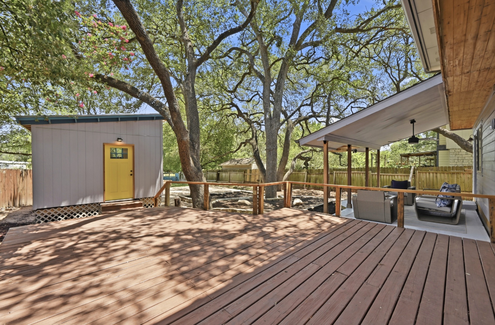 708 Shade Tree Drive Austin, TX 78748 - Photo 5 of 32 A sprawling private back deck stretches off the primary suite and leads to the detached office studio.