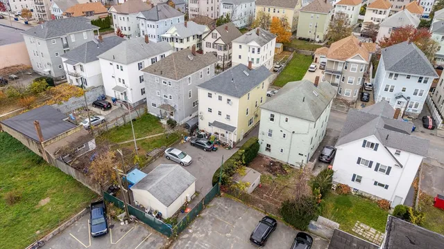 an aerial view of a city with lots of residential buildings