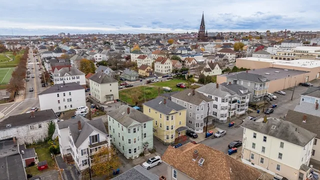 an aerial view of a city with lots of residential buildings