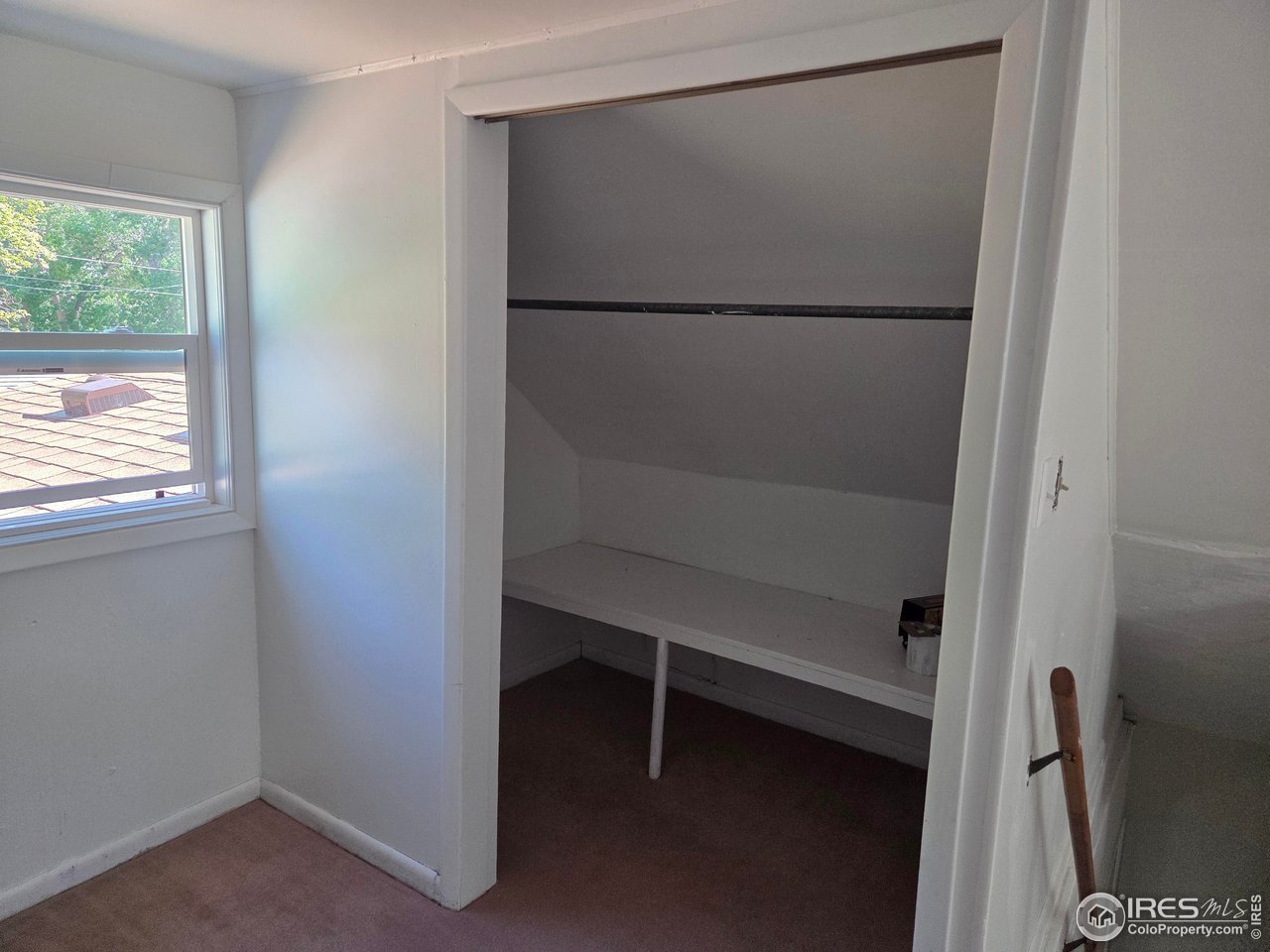 407 Carson Street Brush, CO 80723 - Photo 28 of 38 a view of walk in closet with window
