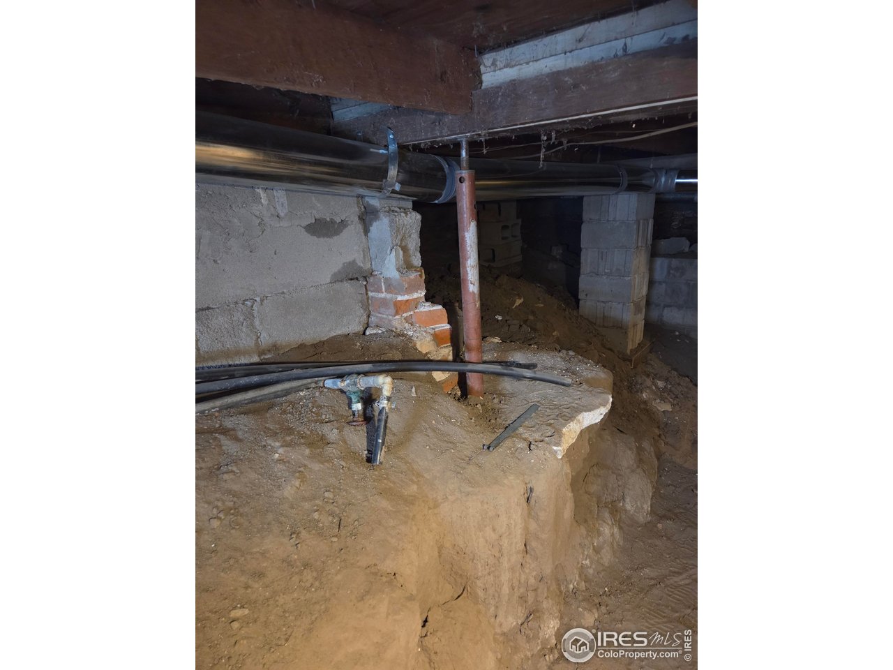 407 Carson Street Brush, CO 80723 - Photo 33 of 38 a view of storage and utility room