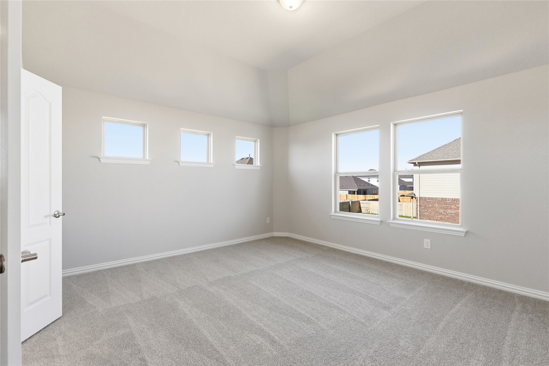13700 Tucker Hedge Pass Elgin, TX 78621 - Photo 6 of 16 Spare room featuring plenty of natural light and light carpet