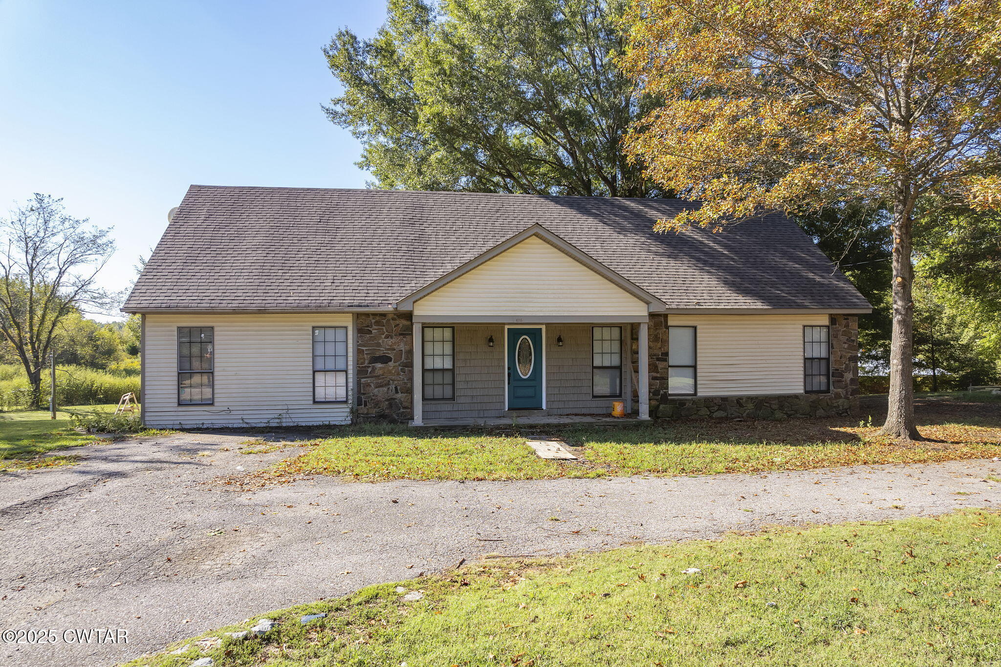 4135 Eurekaton Road Stanton, TN 38069 - Photo 1 of 33 a front view of a house with a yard and swimming pool