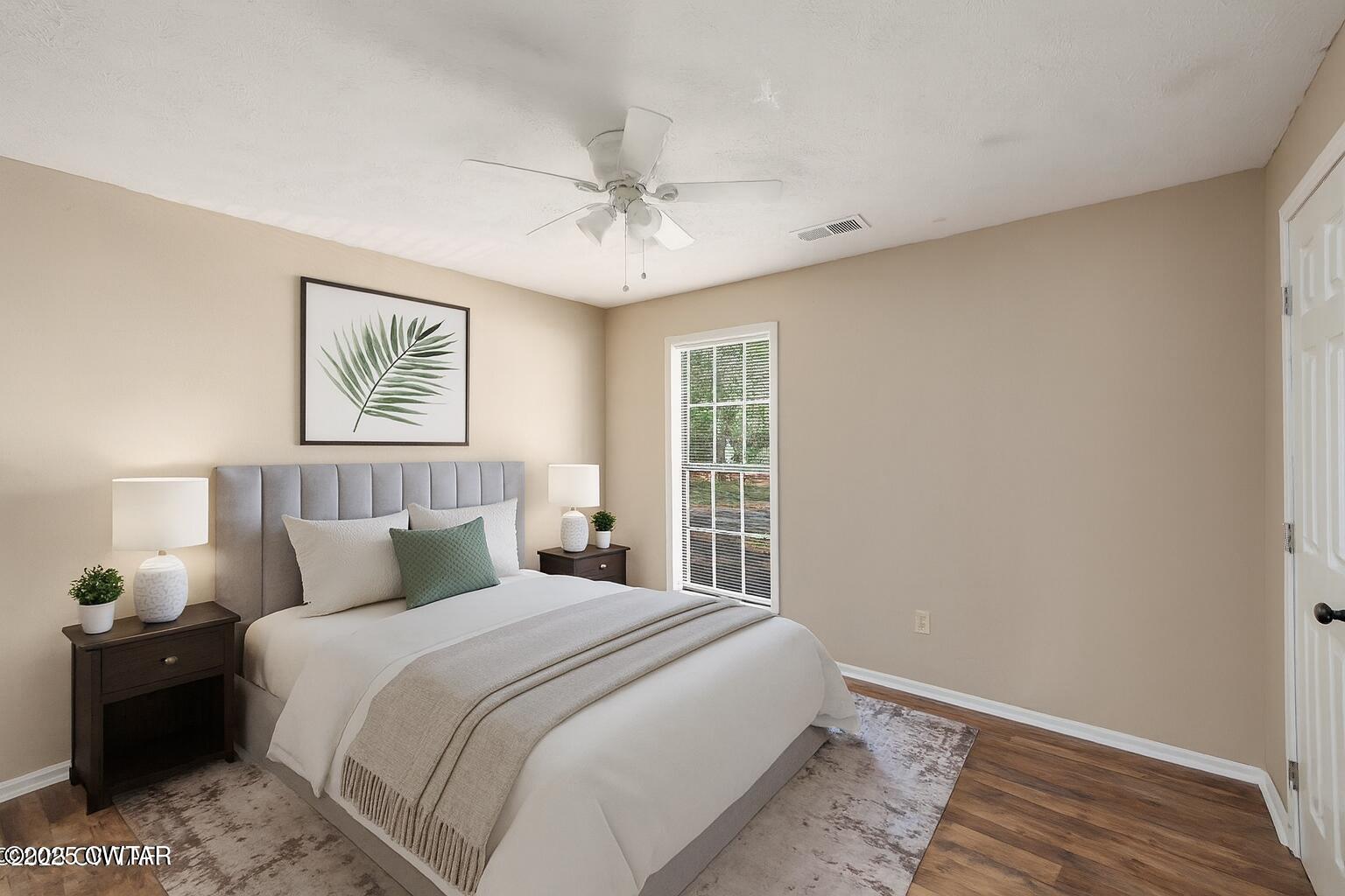 4135 Eurekaton Road Stanton, TN 38069 - Photo 11 of 33 a bedroom with a large bed and a window