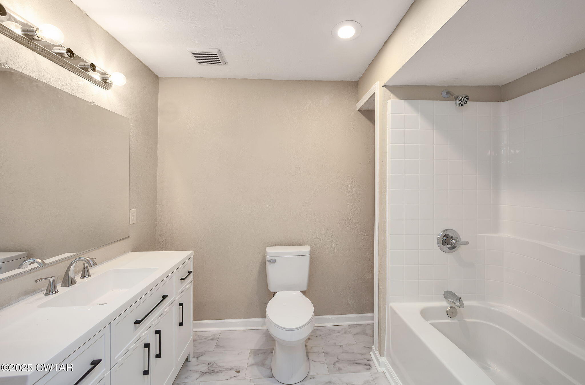 4135 Eurekaton Road Stanton, TN 38069 - Photo 12 of 33 a bathroom with a sink toilet and shower