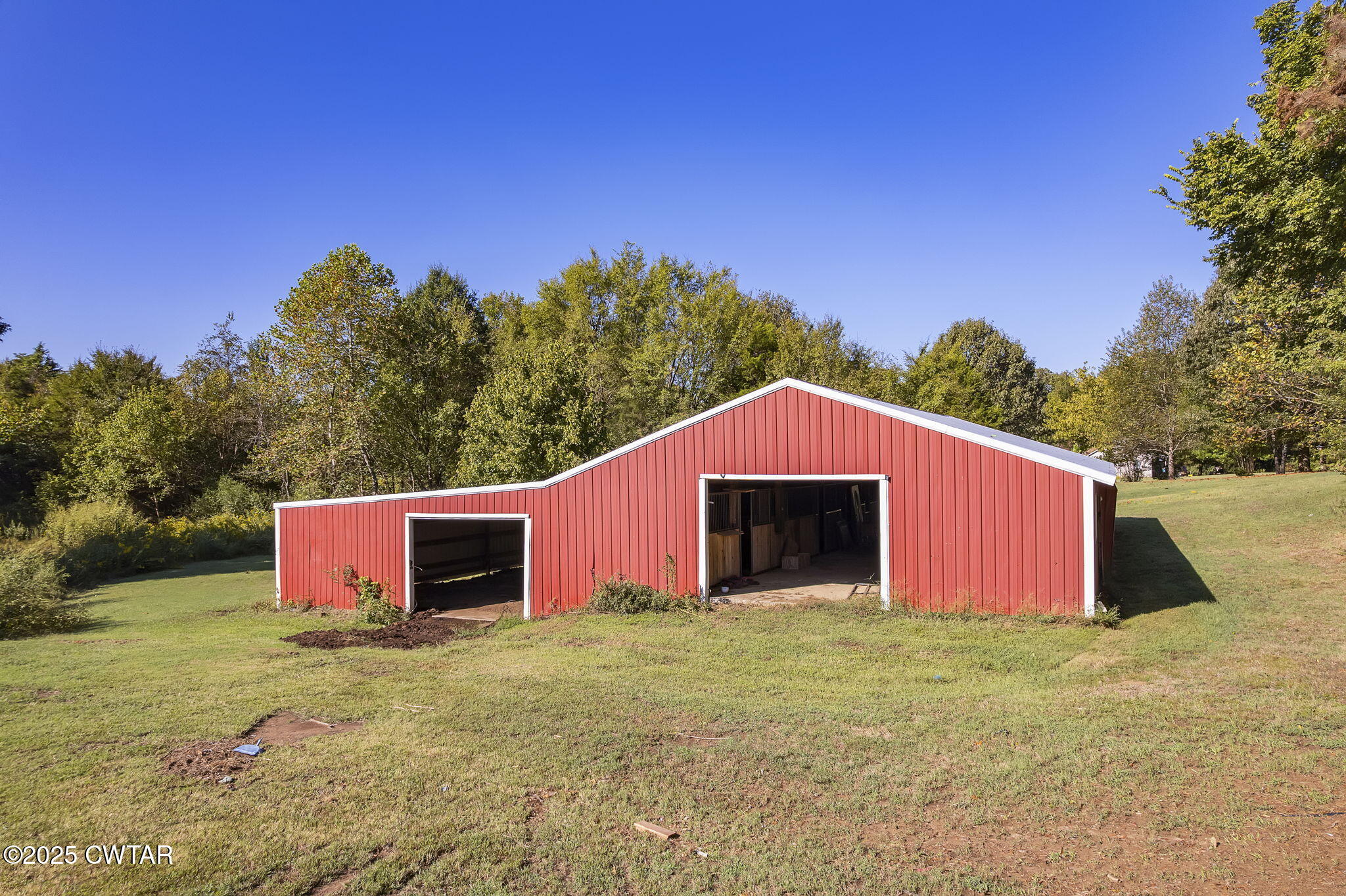 4135 Eurekaton Road Stanton, TN 38069 - Photo 21 of 33 a front view of a house with a garden