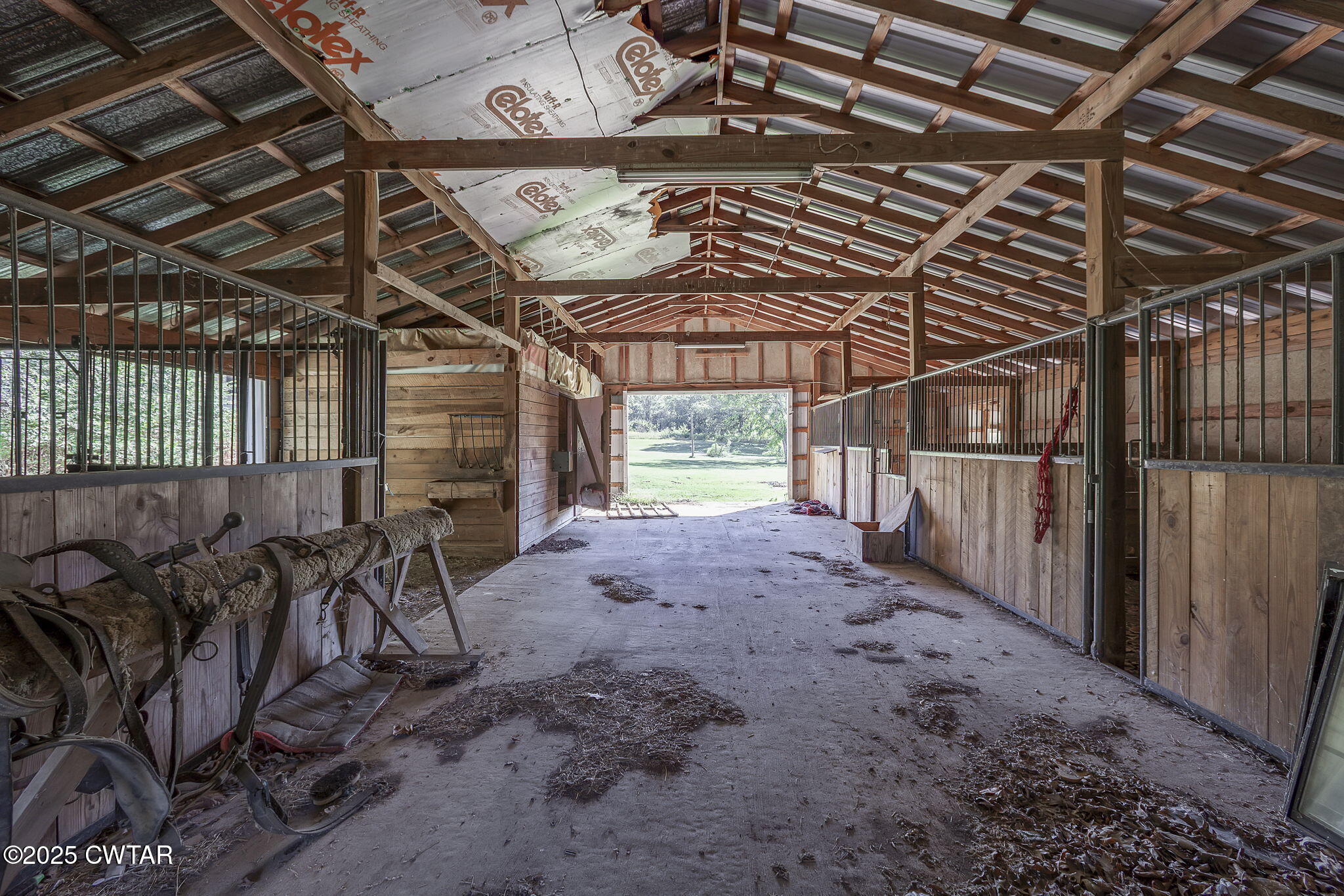 4135 Eurekaton Road Stanton, TN 38069 - Photo 23 of 33 a view of an empty room with wooden walls