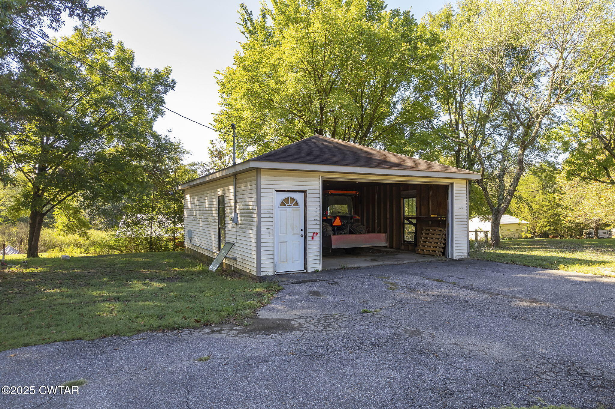 4135 Eurekaton Road Stanton, TN 38069 - Photo 24 of 33 a front view of a house with garden
