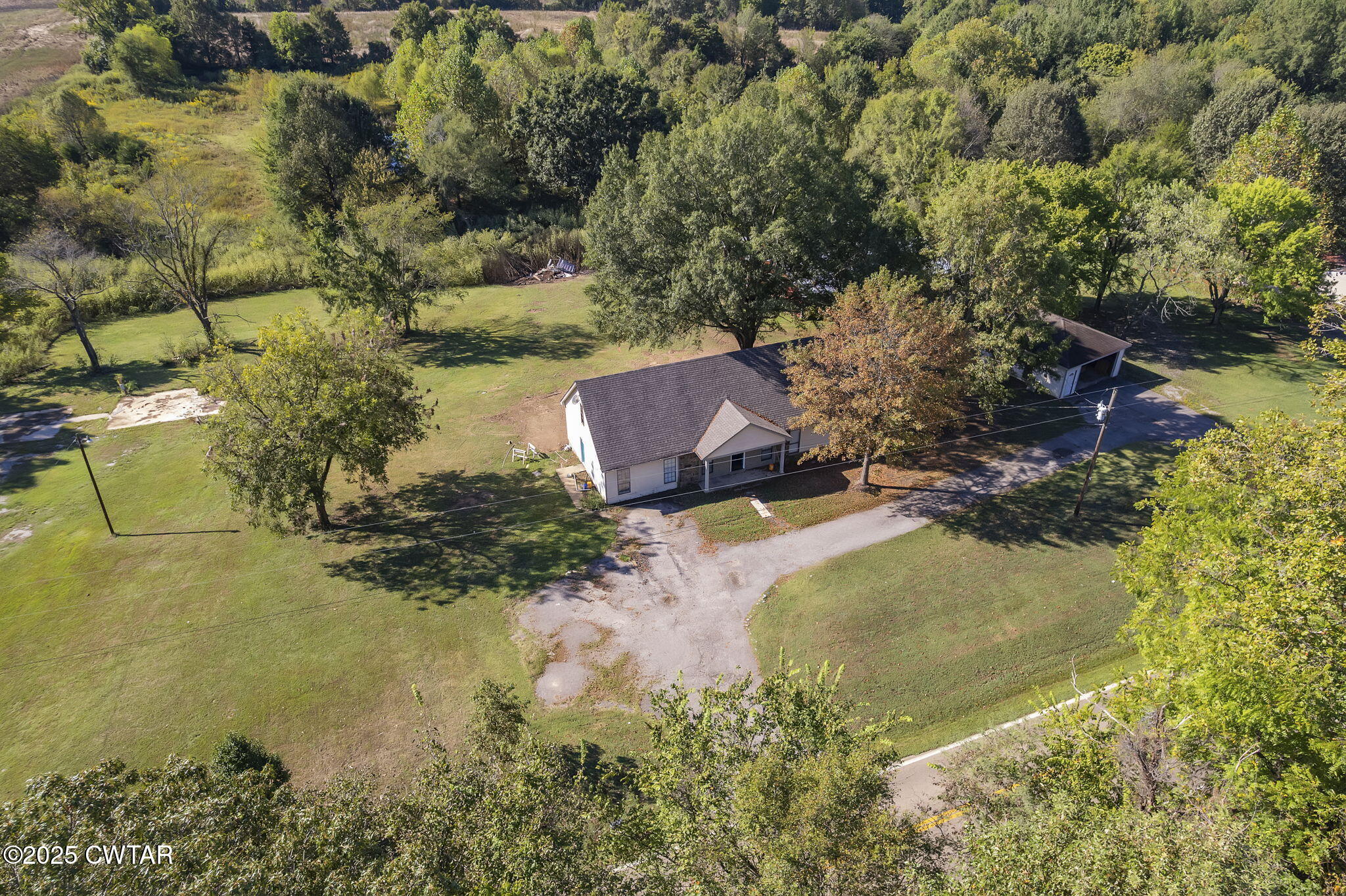 4135 Eurekaton Road Stanton, TN 38069 - Photo 32 of 33 an aerial view of a house with a yard