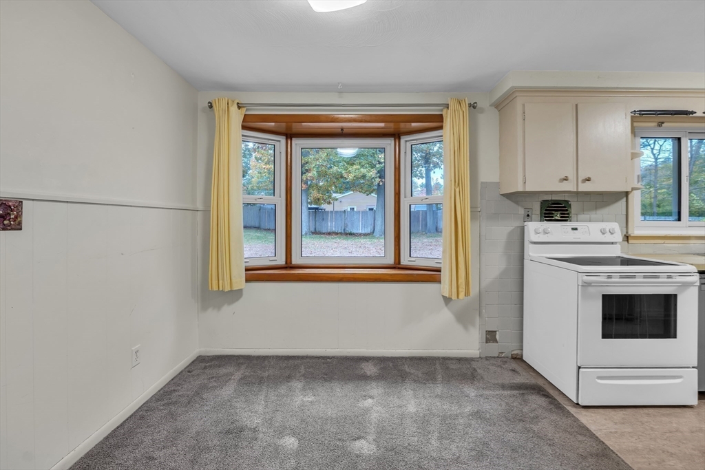 15 Fairbrook Road Framingham, MA 01701 - Photo 12 of 28 a view of a kitchen with a stove top oven